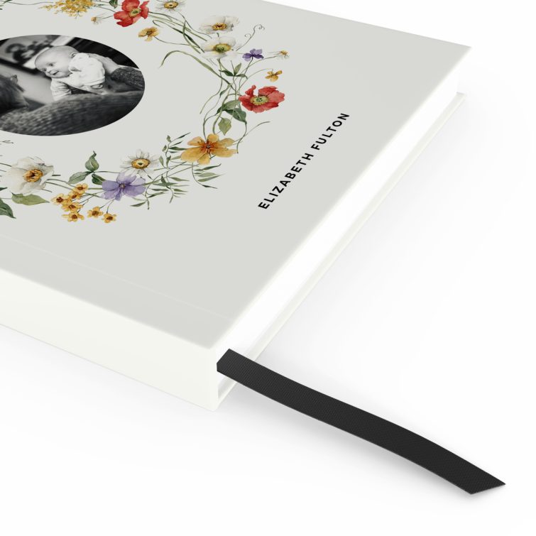 Floral personalised notebook cover design with one black and white photo.