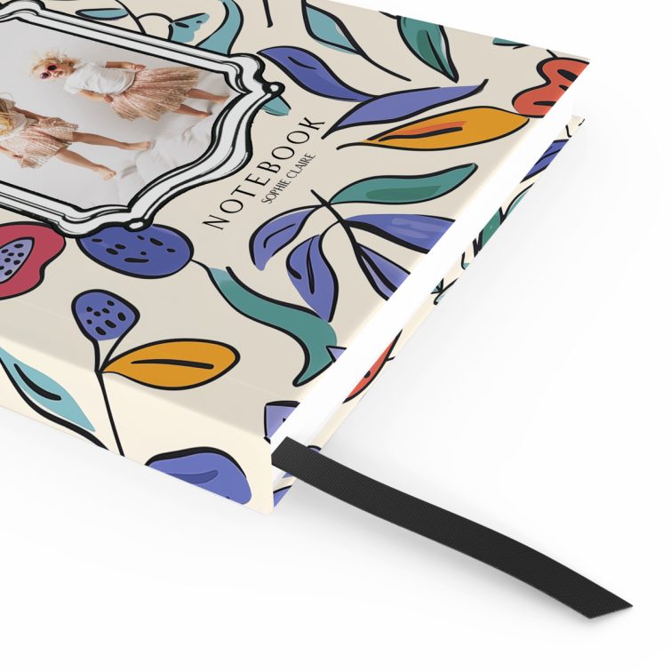 Colourful floral design notebook cover featuring one photo on the front.