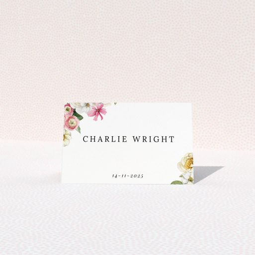 Elegant floral wedding table place card design with two decorative flower illustrations.