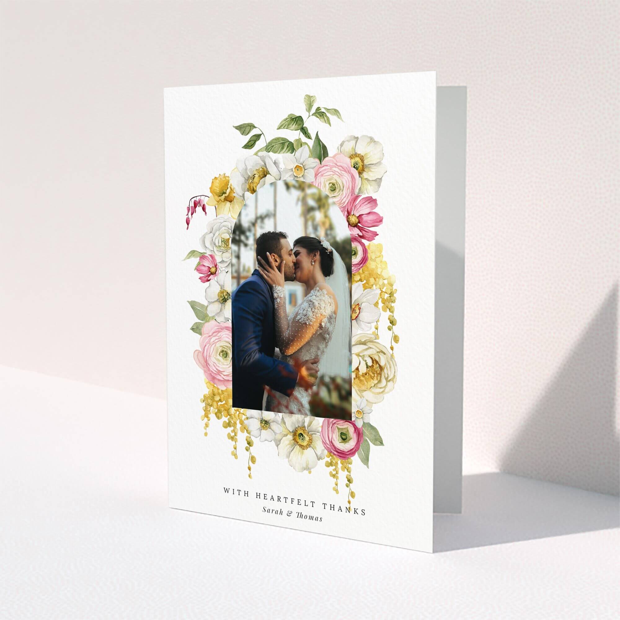 Floral wedding thank you card design with one photo of a couple kissing.