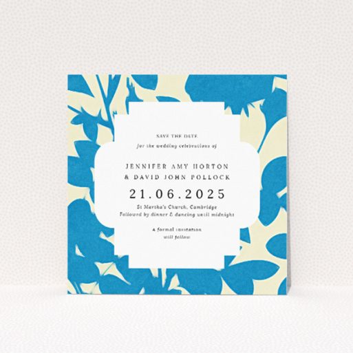 Floral Shadows wedding save the date card featuring unique floral pattern on refreshing blue background with crisp white text box. This is a view of the front