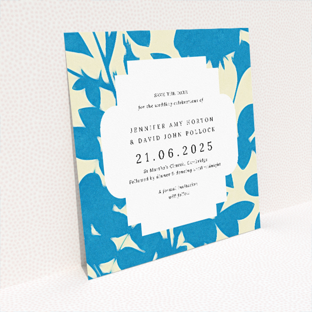 Floral Shadows wedding save the date card featuring unique floral pattern on refreshing blue background with crisp white text box. This image shows the front and back sides together