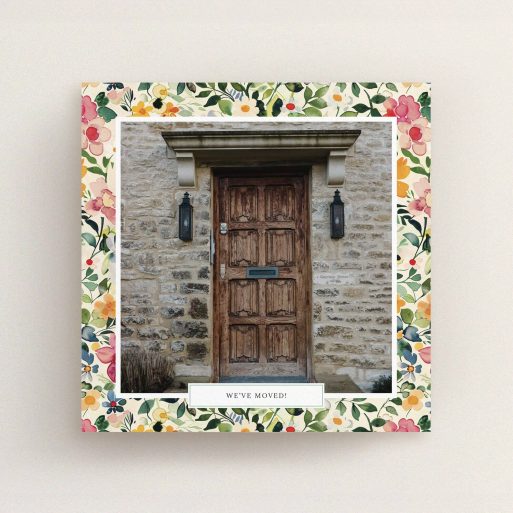Floral change of address card design featuring one photo of a rustic door.
