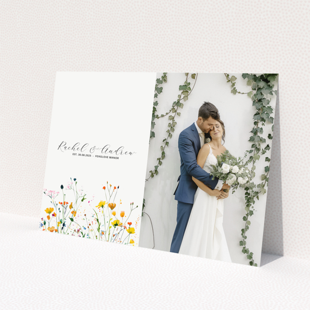 Personalised wedding invitation with floral design and couple photo