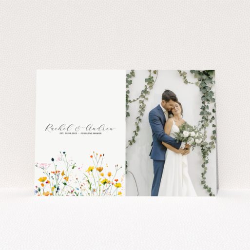 Personalised wedding invitation with floral design and couple photo