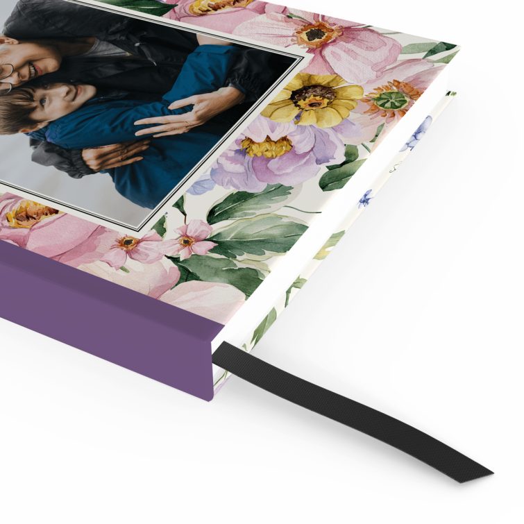 Floral design notebooks cover with one photo on the front.