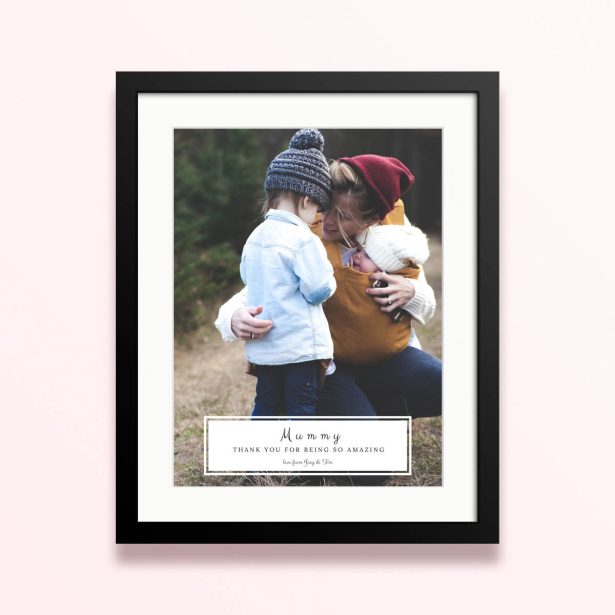 Framed and mounted photo print with one photo featuring an outdoor family scene.