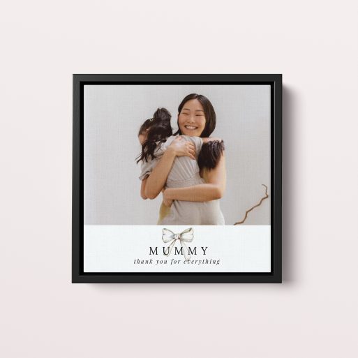 Tied with a Bow Framed Photo Canvases - A chic freestanding portrait display, a perfect Mother's Day gift expressing love with timeless elegance.