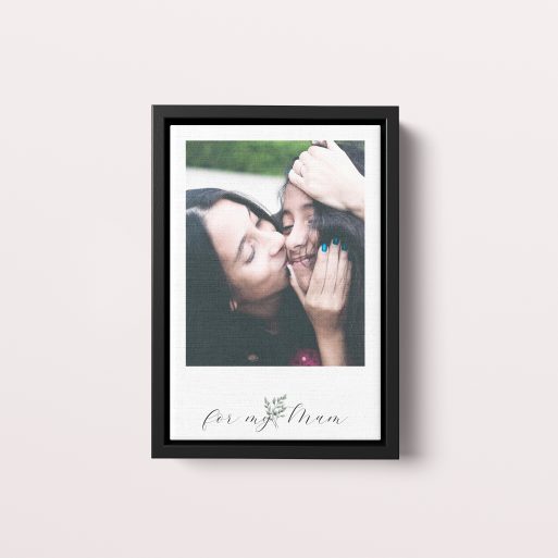 Photo of a framed photo canvase called 'Mom’s Smile'. It is 30cm x 20cm in size, in a Portrait orientation. It has space for 1 photos.