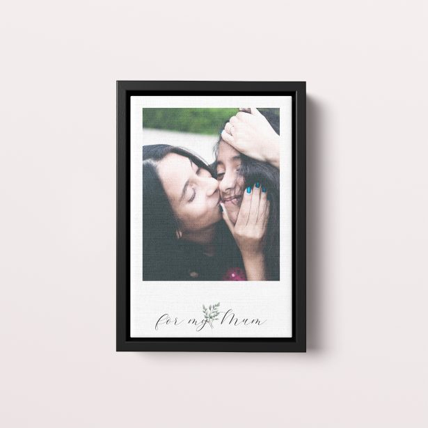 Photo of a framed photo canvase called 'Mom’s Smile'. It is 30cm x 20cm in size, in a Portrait orientation. It has space for 1 photos.