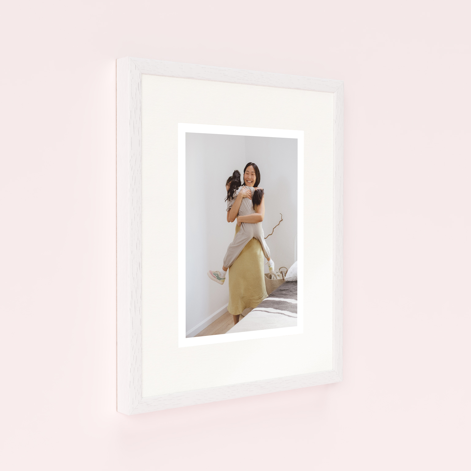 Photo of a framed photo print called 'Medium White Frame'. It is 40cm x 30cm in size, in a Portrait orientation. It has space for 1 photos.