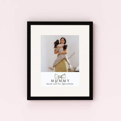 Photo of a framed photo print called 'Tied with a bow'. It is 40cm x 30cm in size, in a Portrait orientation. It has space for 1 photos.