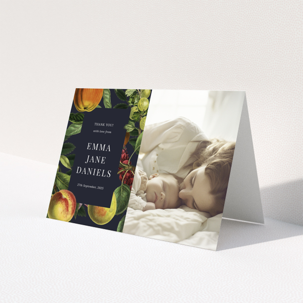 Baby thank you card with floral design and one photo of a baby sleeping next to a woman.