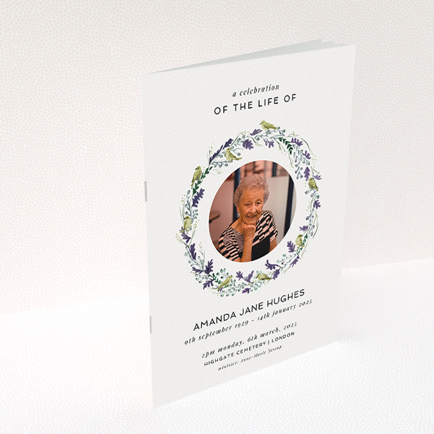 A funeral order of service named "Bird wreath. It is an A5 booklet in a portrait orientation. It is a photographic funeral order of service with room for 1 photo. "Bird wreath" is available as a folded booklet booklet, with tones of green and purple.