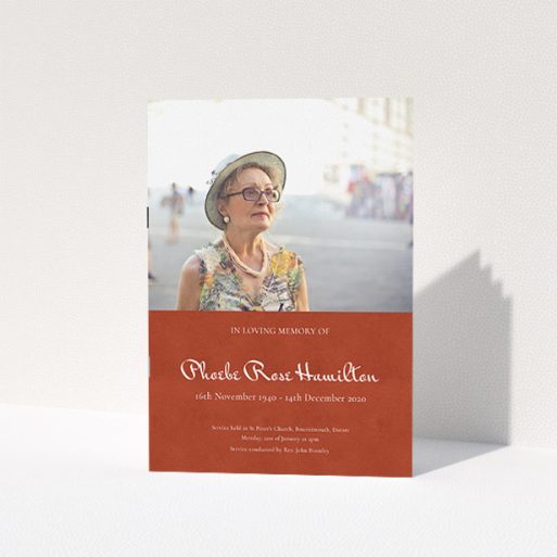 A funeral order of service named "Simple Elegance. It is an A5 booklet in a portrait orientation. It is a photographic funeral program with room for 1 photo. "Simple Elegance" is available as a folded booklet booklet, with splashes of red.