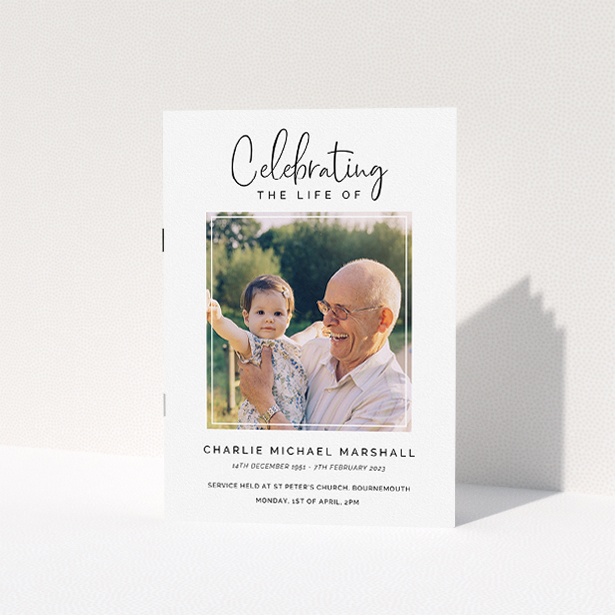 A funeral order of service named "Uplifting Remembrance. It is an A5 booklet in a portrait orientation. It is a photographic funeral order of service with room for 1 photo. "Uplifting Remembrance" is available as a folded booklet booklet, with tones of white and black.