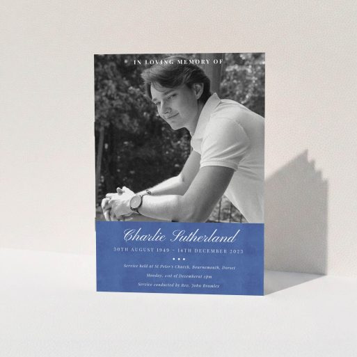 Funeral and Memorial Service Program - "Bold Elegance" A funeral order of service named "Bold Elegance. It is an A5 booklet in a portrait orientation. It is a photographic funeral program with room for 1 photo. "Bold Elegance" is available as a folded booklet booklet, with splashes of navy blue.