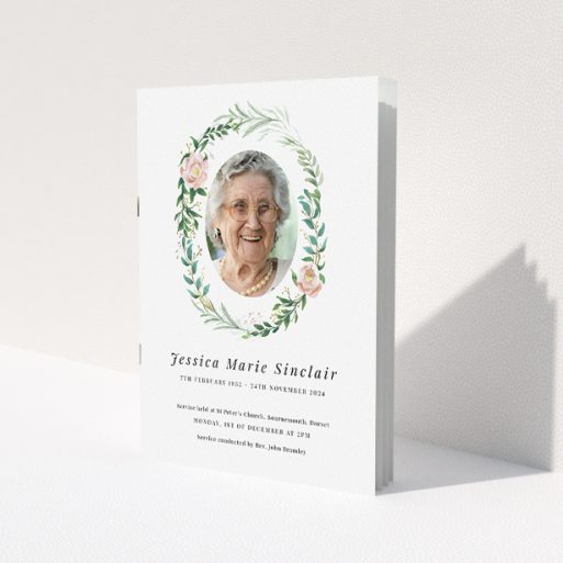 A funeral order of service named 'Floral celebration. It is an A5 booklet in a portrait orientation. It is a photographic funeral program with room for 1 photo. 'Floral celebration' is available as a folded booklet booklet, with tones of white, light pink and green.