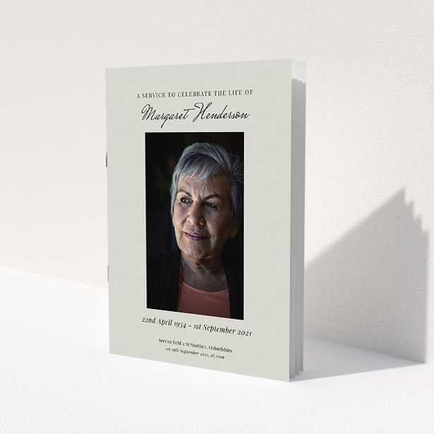 A funeral order of service named 'Simple Portrait. It is an A5 booklet in a portrait orientation. It is a photographic funeral order of service with room for 1 photo. 'Simple Portrait' is available as a folded booklet booklet, with tones of cream and grey.