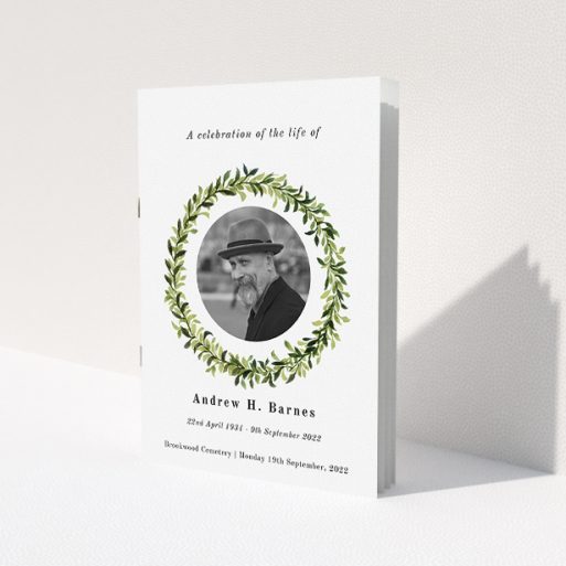 A funeral order of service named 'Solemn wreath. It is an A5 booklet in a portrait orientation. It is a photographic funeral program with room for 1 photo. 'Solemn wreath' is available as a folded booklet booklet, with tones of white and green.