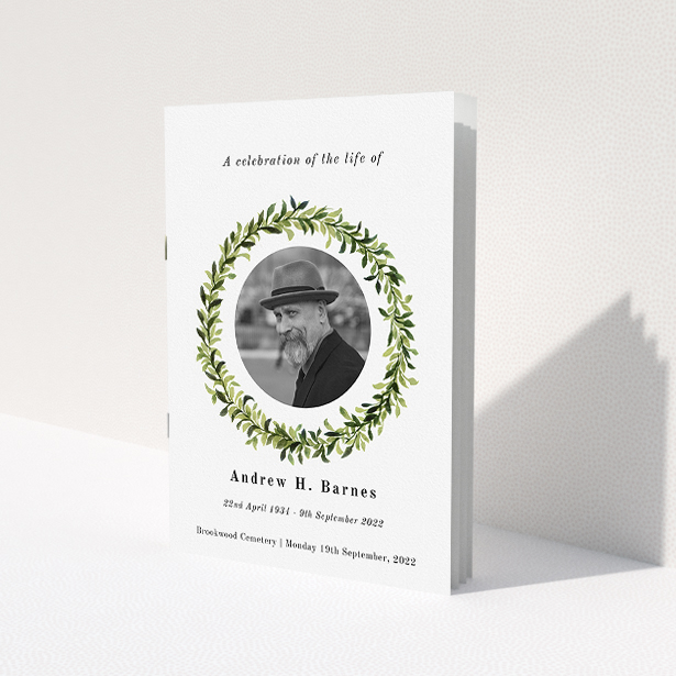 A funeral order of service named "Solemn wreath. It is an A5 booklet in a portrait orientation. It is a photographic funeral order of service with room for 1 photo. "Solemn wreath" is available as a folded booklet booklet, with tones of white and green.