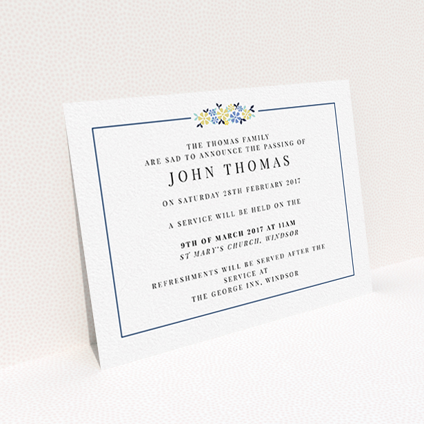 A funeral announcement card design called "A celebration and flowers". It is an A6 card in a landscape orientation. "A celebration and flowers" is available as a flat card, with tones of white and blue.