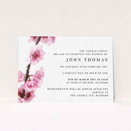 A funeral announcement card named "Blossom at an angle". It is an A6 card in a landscape orientation. "Blossom at an angle" is available as a flat card, with tones of pink and white.