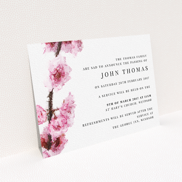 A funeral announcement card named "Blossom at an angle". It is an A6 card in a landscape orientation. "Blossom at an angle" is available as a flat card, with tones of pink and white.