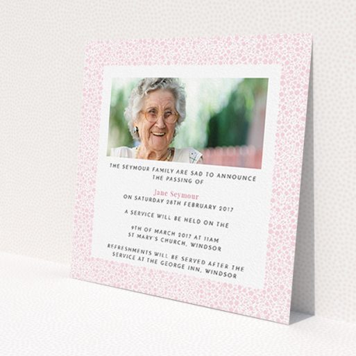 A funeral announcement card called 'Floral Remembrance'. It is a square (148mm x 148mm) card in a square orientation. It is a photographic funeral announcement card with room for 1 photo. 'Floral Remembrance' is available as a flat card, with tones of pink and white.