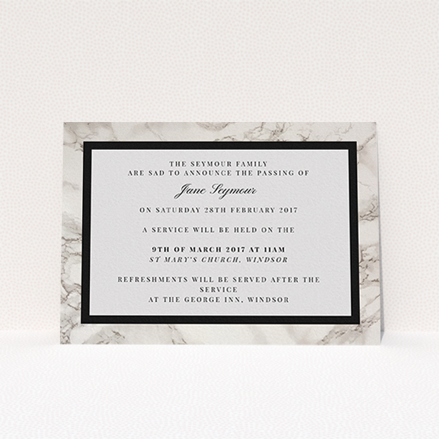 A funeral announcement card design named "Stead fast marble". It is an A6 card in a landscape orientation. "Stead fast marble" is available as a flat card, with tones of grey and black.