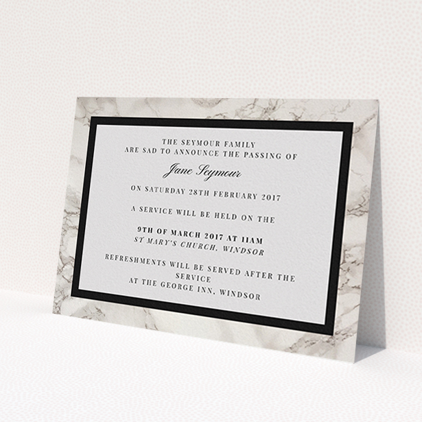 A funeral announcement card design named 'Stead fast marble'. It is an A6 card in a landscape orientation. 'Stead fast marble' is available as a flat card, with tones of grey and black.