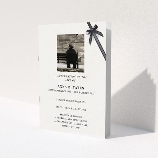 A funeral ceremony program template titled 'Peacefully tied'. It is an A5 booklet in a portrait orientation. It is a photographic funeral ceremony program with room for 1 photo. 'Peacefully tied' is available as a folded booklet booklet, with tones of pale cream and faded black.