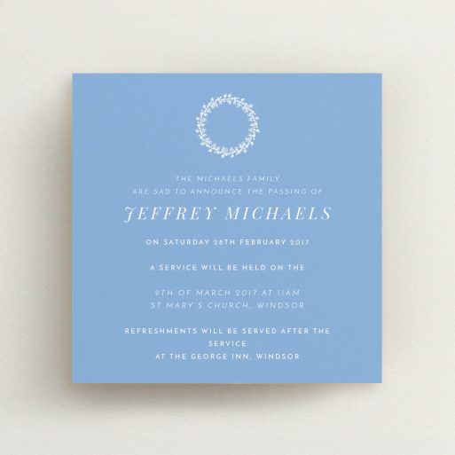 A funeral invite named "White flower circle". It is a square (148mm x 148mm) invite in a square orientation. "White flower circle" is available as a flat invite, with tones of blue and white.