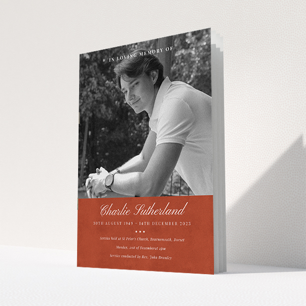 A funeral order of service named "Bold Elegance. It is an A5 booklet in a portrait orientation. It is a photographic funeral program with room for 1 photo. "Bold Elegance" is available as a folded booklet booklet, with splashes of red.