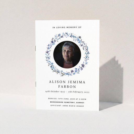 Funeral Order of Service Design - "Blue Floral" A funeral order of service named "Blue Floral. It is an A5 booklet in a portrait orientation. It is a photographic funeral program with room for 1 photo. "Blue Floral" is available as a folded booklet booklet, with tones of blue, light blue and purple.