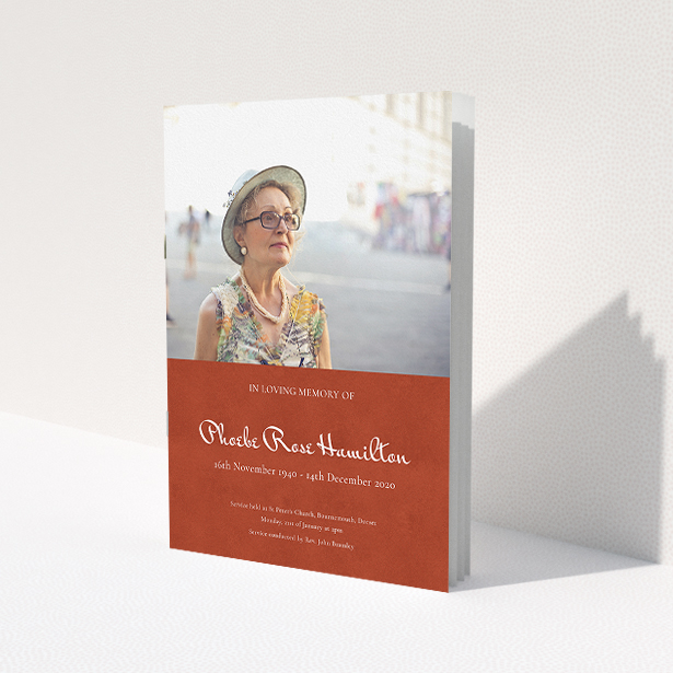 A funeral order of service named 'Simple Elegance. It is an A5 booklet in a portrait orientation. It is a photographic funeral program with room for 1 photo. 'Simple Elegance' is available as a folded booklet booklet, with splashes of red.
