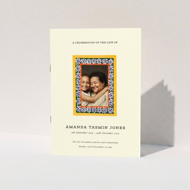 Funeral order of service program cover design with one photo and decorative floral border.