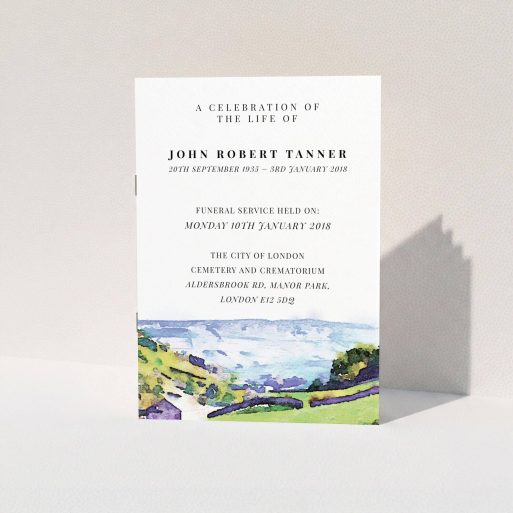 A funeral order of service design named "Over the Dales". It is an A5 booklet in a portrait orientation. "Over the Dales" is available as a folded booklet booklet, with tones of green, light blue and purple.