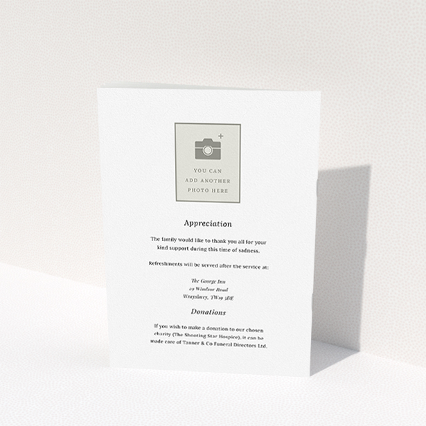 A funeral order of service named "Simple Silver. It is an A5 booklet in a portrait orientation. It is a photographic funeral program with room for 1 photo. "Simple Silver" is available as a folded booklet booklet, with tones of white, grey and black.