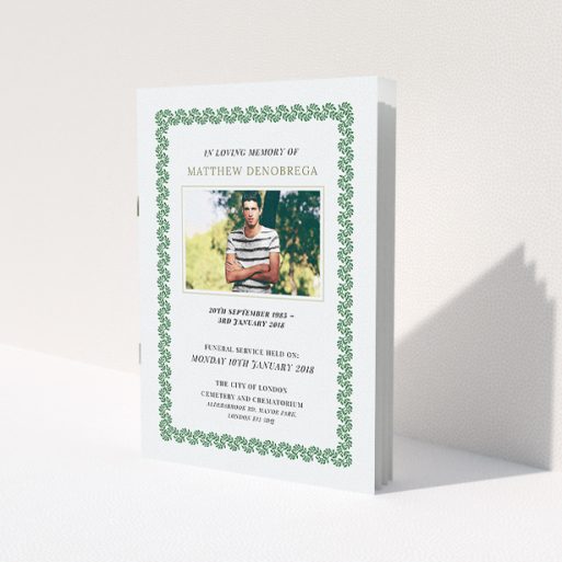 A funeral order of service design titled 'Surrounded by the hedge'. It is an A5 booklet in a portrait orientation. It is a photographic funeral order of service with room for 1 photo. 'Surrounded by the hedge' is available as a folded booklet booklet, with mainly green colouring.