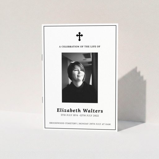 A funeral order of service named "Simple and Straightforward. It is an A5 booklet in a portrait orientation. It is a photographic funeral program with room for 1 photo. "Simple and Straightforward" is available as a folded booklet booklet, with tones of white and black.