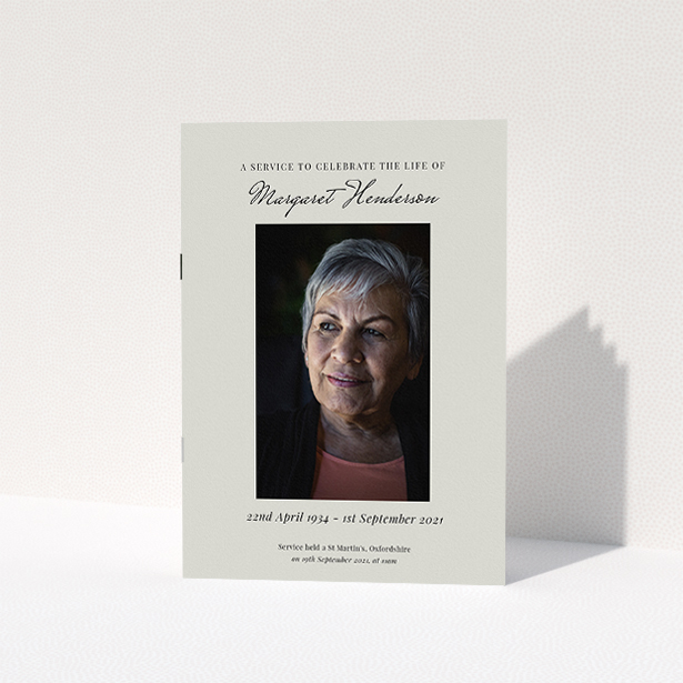A funeral order of service named "Simple Portrait. It is an A5 booklet in a portrait orientation. It is a photographic funeral order of service with room for 1 photo. "Simple Portrait" is available as a folded booklet booklet, with tones of cream and grey.