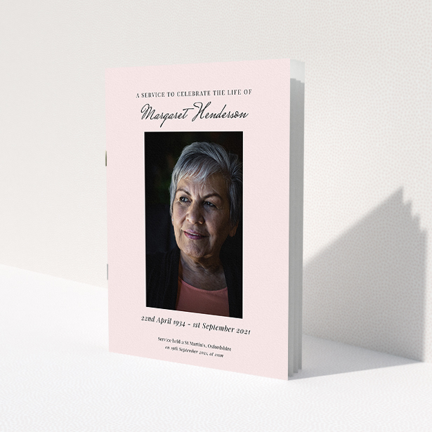 A funeral order of service named "Simple Portrait. It is an A5 booklet in a portrait orientation. It is a photographic funeral order of service with room for 1 photo. "Simple Portrait" is available as a folded booklet booklet, with splashes of light pink.