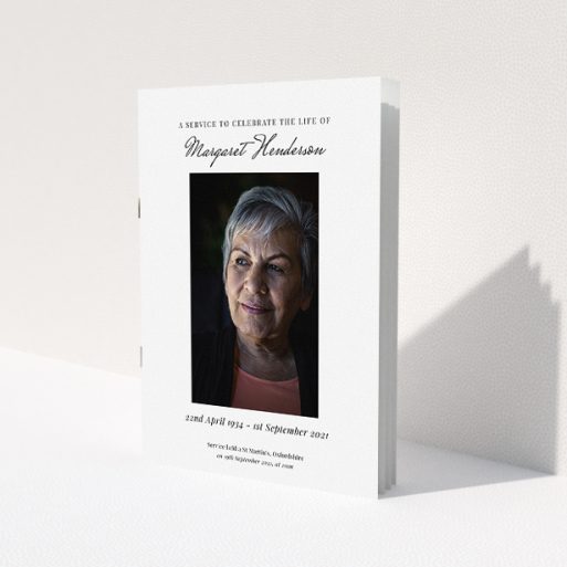 A funeral order of service named 'Simple Portrait. It is an A5 booklet in a portrait orientation. It is a photographic funeral order of service with room for 1 photo. 'Simple Portrait' is available as a folded booklet booklet, with tones of white and black.