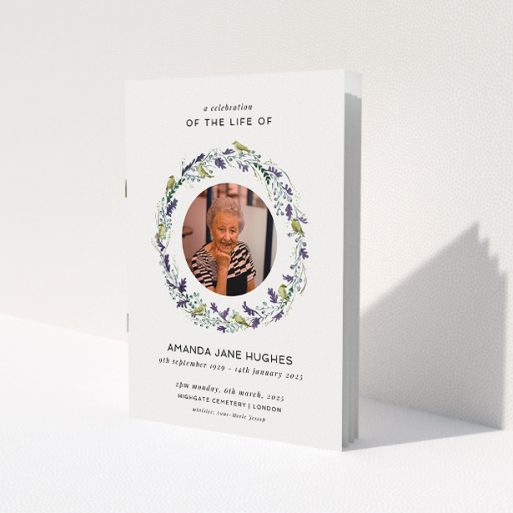 A funeral order of service named 'Bird wreath. It is an A5 booklet in a portrait orientation. It is a photographic funeral program with room for 1 photo. 'Bird wreath' is available as a folded booklet booklet, with tones of green and purple.