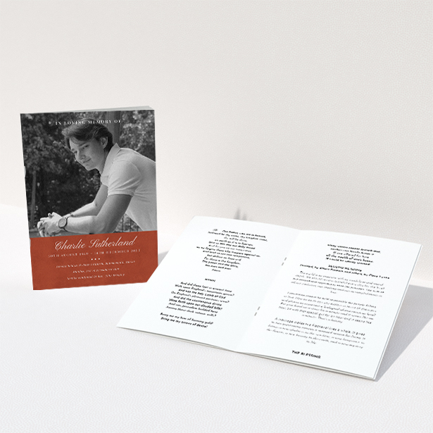 A funeral order of service named "Bold Elegance. It is an A5 booklet in a portrait orientation. It is a photographic funeral program with room for 1 photo. "Bold Elegance" is available as a folded booklet booklet, with splashes of red.