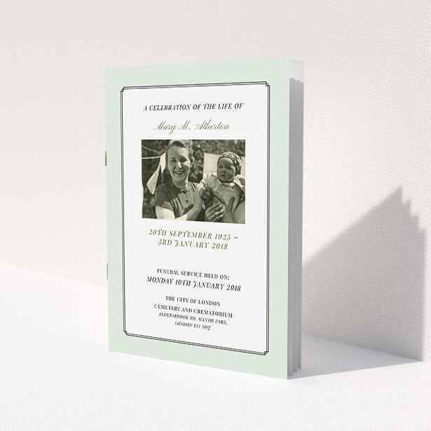A funeral service program design named 'Mint art deco'. It is an A5 booklet in a portrait orientation. It is a photographic funeral service program with room for 1 photo. 'Mint art deco' is available as a folded booklet booklet, with tones of green and white.