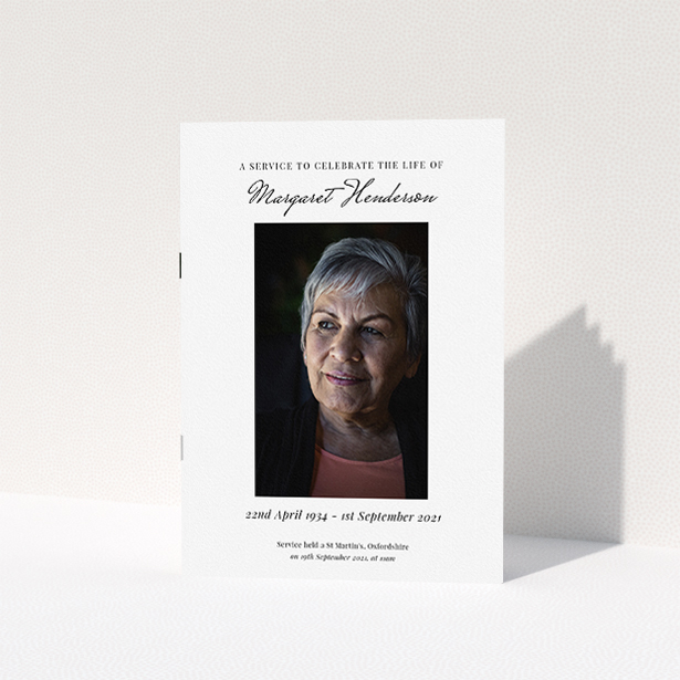 A funeral order of service named "Simple Portrait. It is an A5 booklet in a portrait orientation. It is a photographic funeral order of service with room for 1 photo. "Simple Portrait" is available as a folded booklet booklet, with tones of white and black.