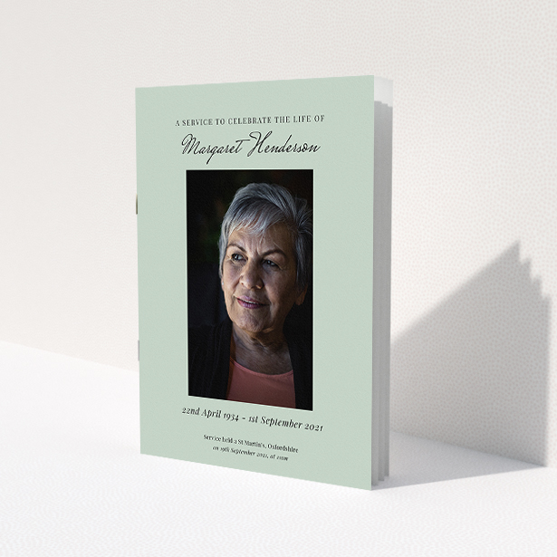 A funeral order of service named "Simple Portrait. It is an A5 booklet in a portrait orientation. It is a photographic funeral order of service with room for 1 photo. "Simple Portrait" is available as a folded booklet booklet, with splashes of green.