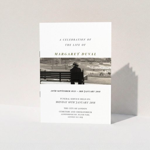 A funeral service program design titled "To the horizon". It is an A5 booklet in a portrait orientation. It is a photographic funeral service program with room for 1 photo. "To the horizon" is available as a folded booklet booklet, with tones of white and Dark gold.